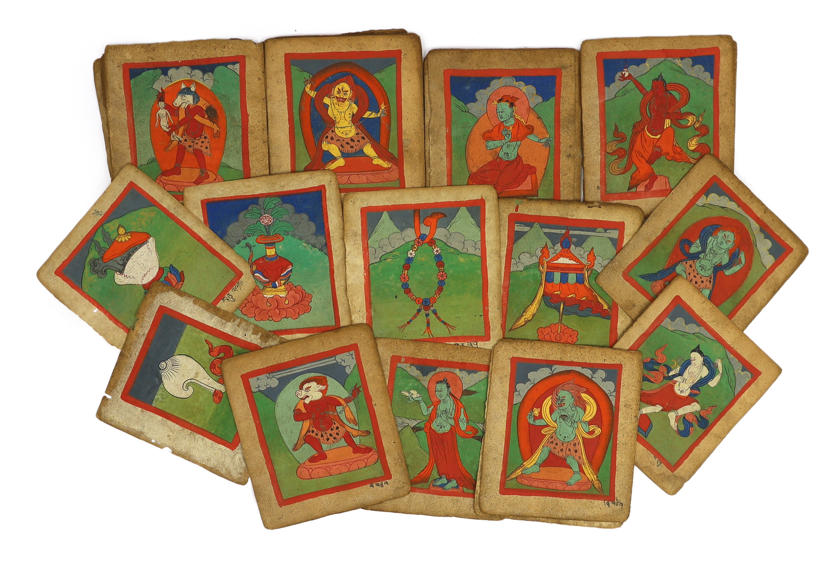 A set of thirty six Tibetan painted thangka pages, 19th century